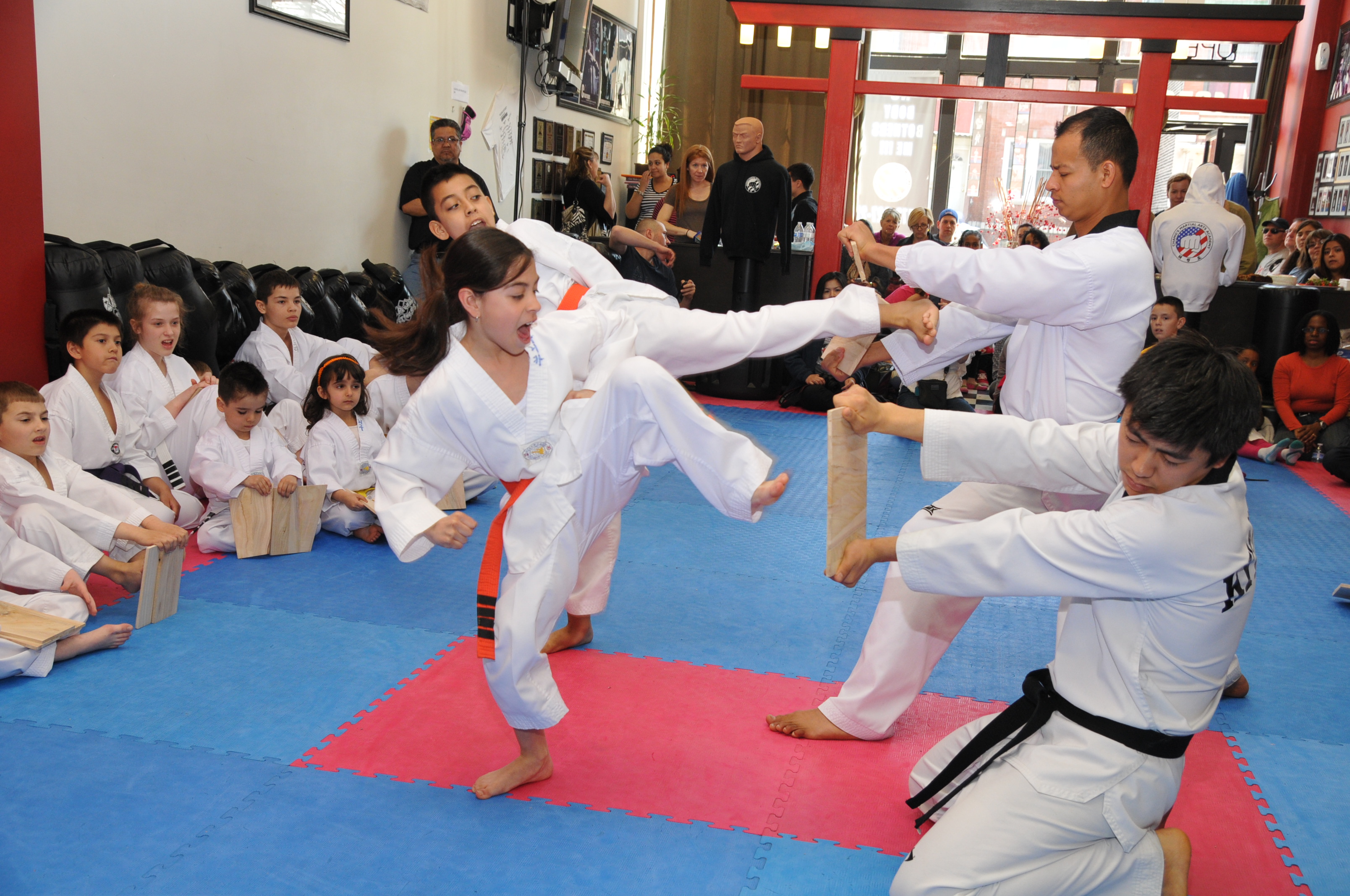 Martial arts students practicing partner drills
